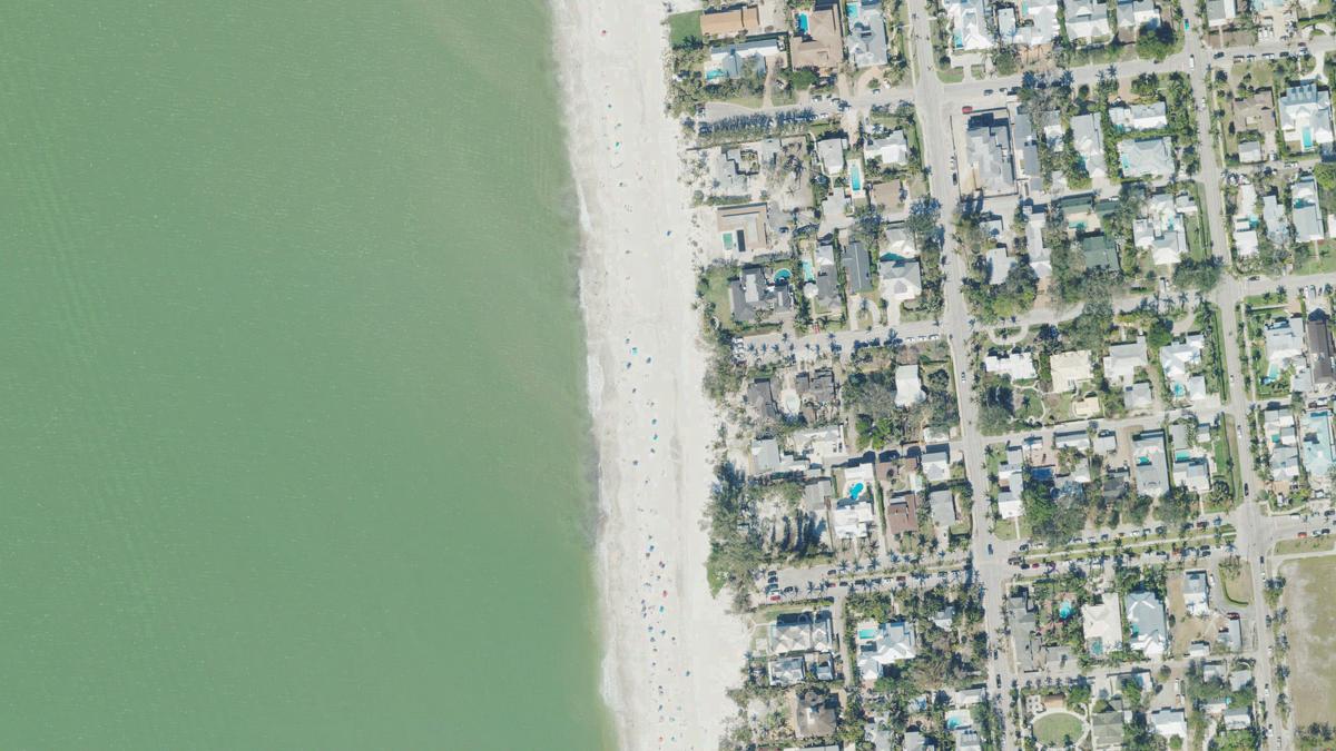 Aerial view of 11th Avenue South Beach in Naples, Florida, shoreline and surroundings, USDA NAIP imagery from May 2023