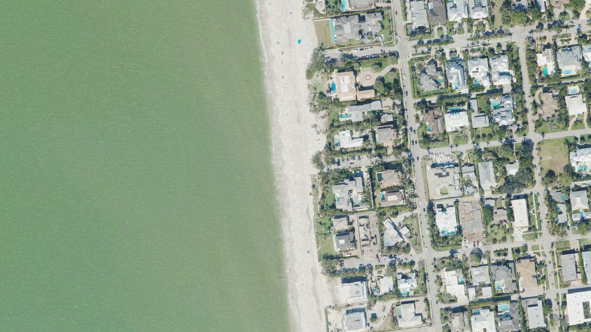 Aerial view of 1st Avenue South Beach in Naples, Florida, shoreline and surroundings, USDA NAIP imagery from May 2023