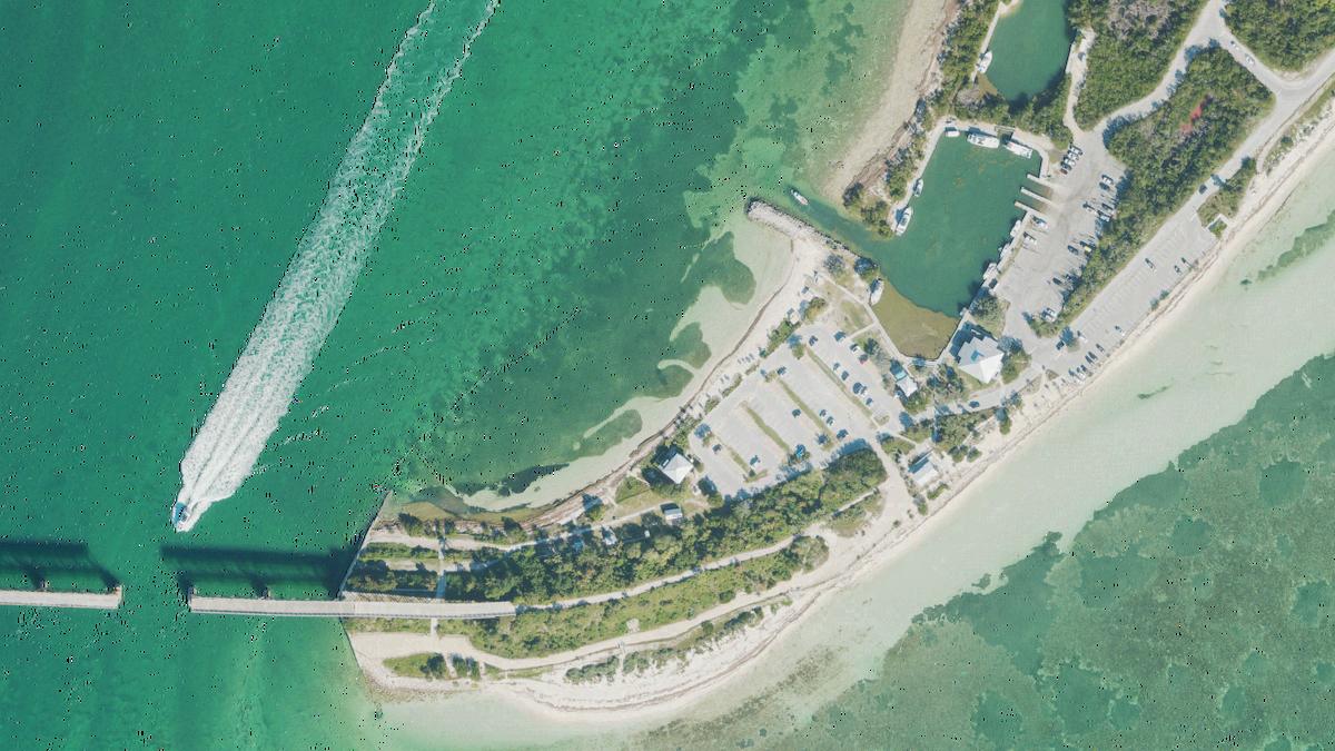 Aerial view of Calusa Beach in Marathon, Florida, shoreline and surroundings, USDA NAIP imagery from May 2023