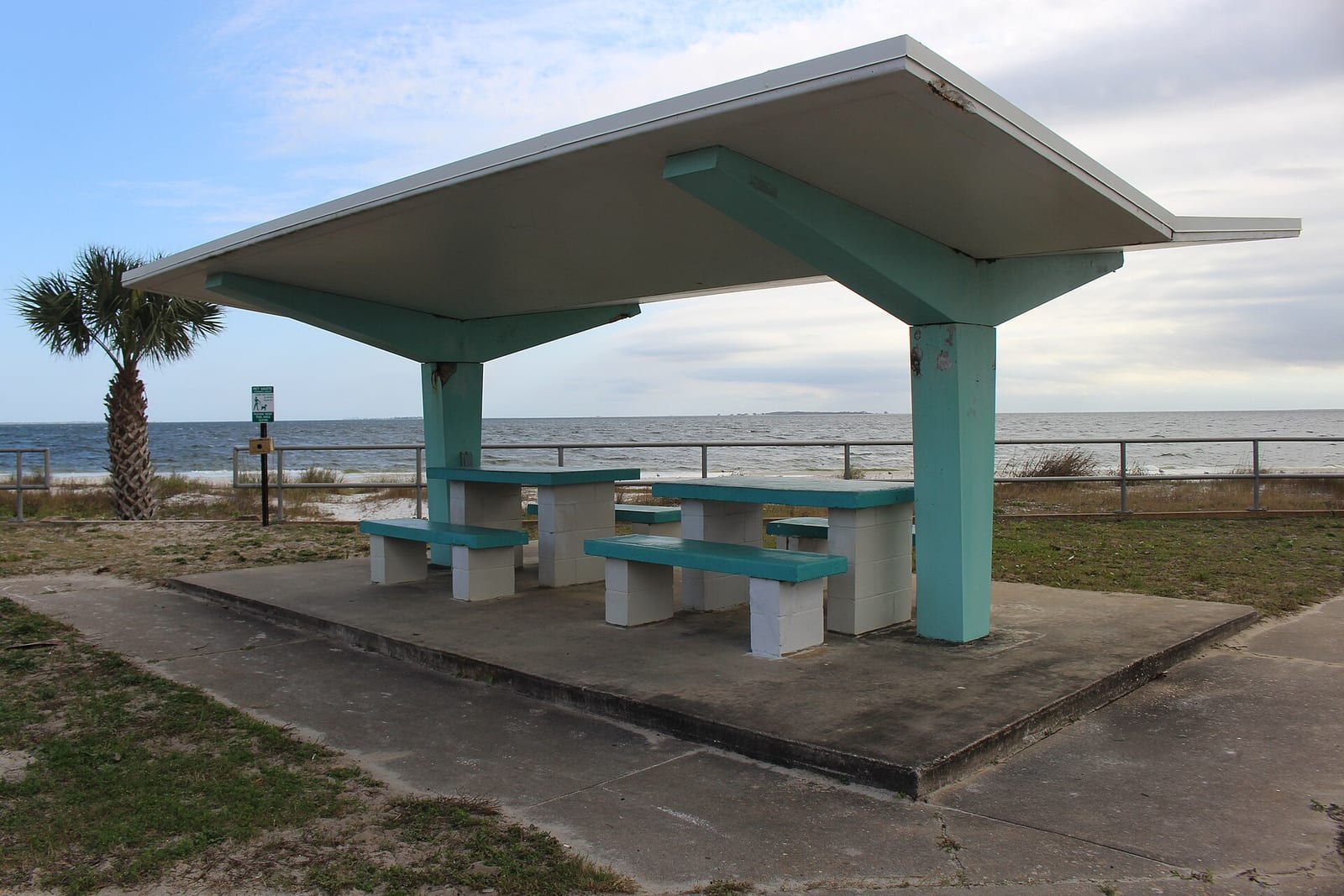 Carabelle Beach: picnic shelter with benches overlooking beach and ocean