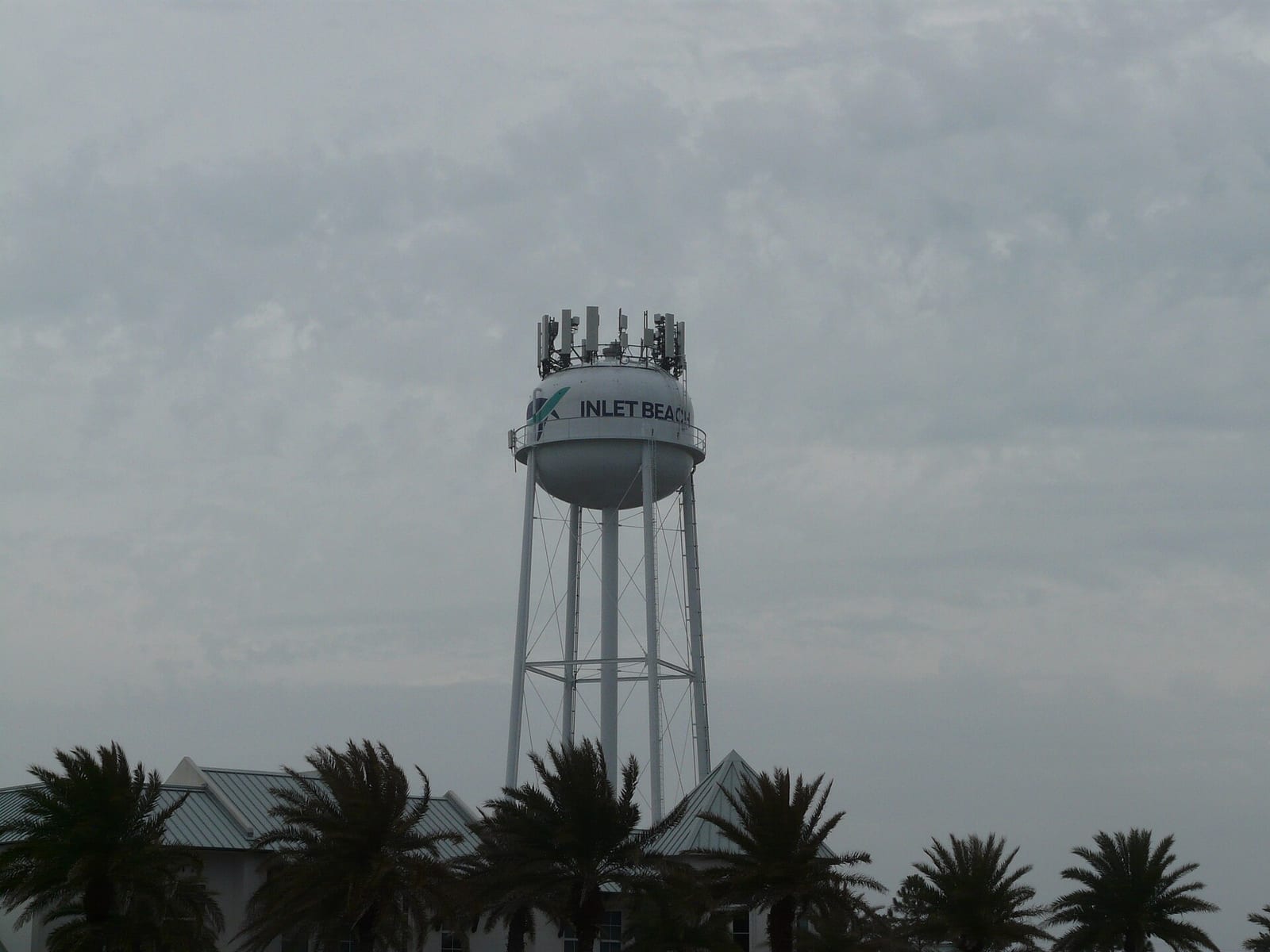 Eastern Green Beach: water tower labeled Inlet Beach with palm trees below