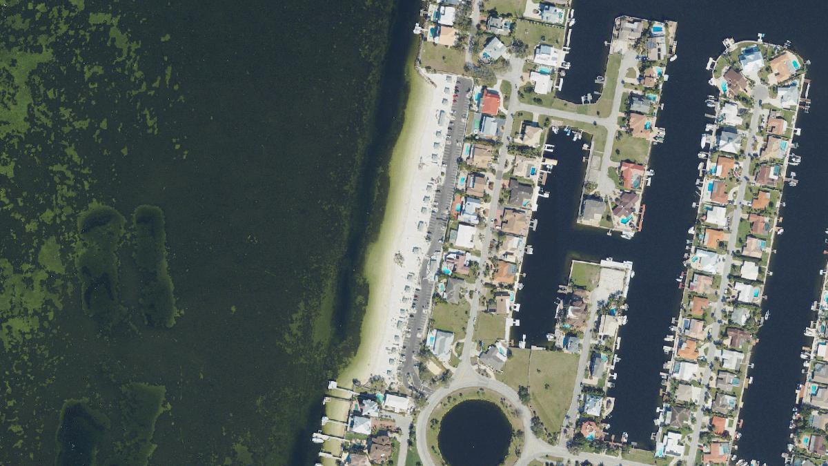 Aerial view of Gulf Harbors Beach Club in Florida, shoreline and surroundings, USDA NAIP imagery from May 2023