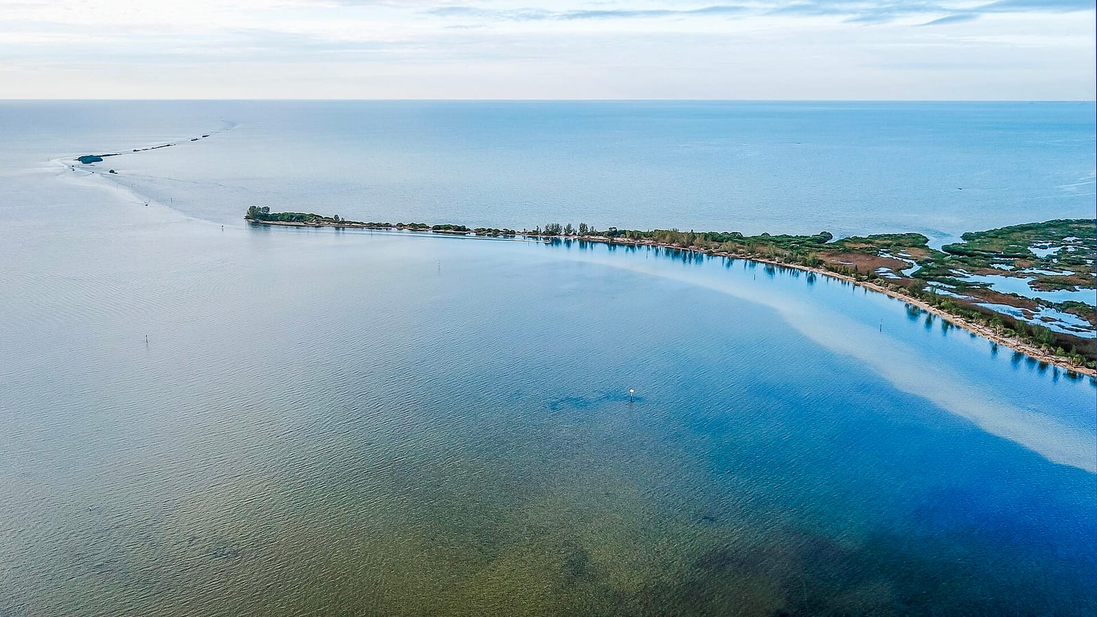 Hernando Beach: aerial view of shallow coastal waters and settlement along shoreline