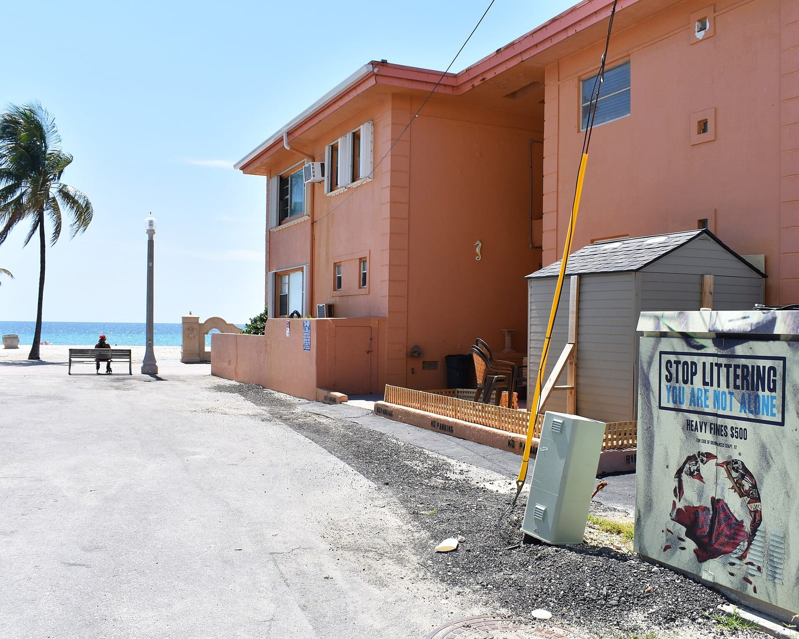 Hollywood Beach: beachfront residential building with palm tree and ocean view