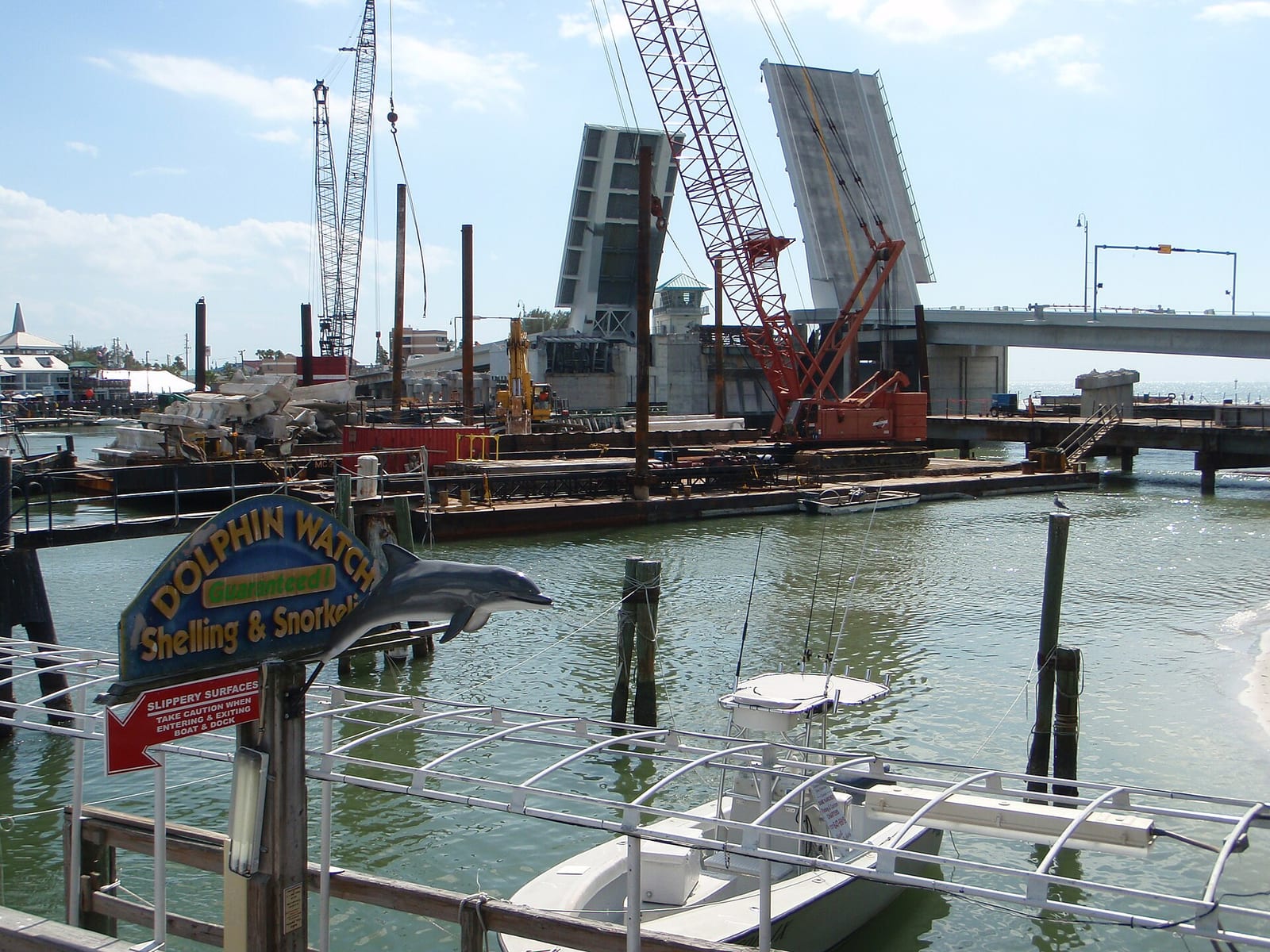 Hubbard's Beach: industrial harbor with construction cranes, boats, and waterfront infrastructure