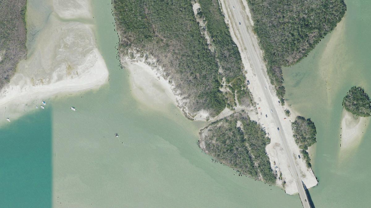 Aerial view of Lee County Dog Beach in Florida, shoreline and surroundings, USDA NAIP imagery from May 2023
