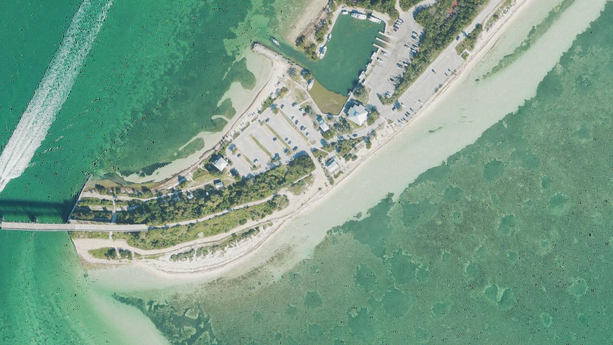 Aerial view of Loggerhead Beach in Marathon, Florida, shoreline and surroundings, USDA NAIP imagery from May 2023