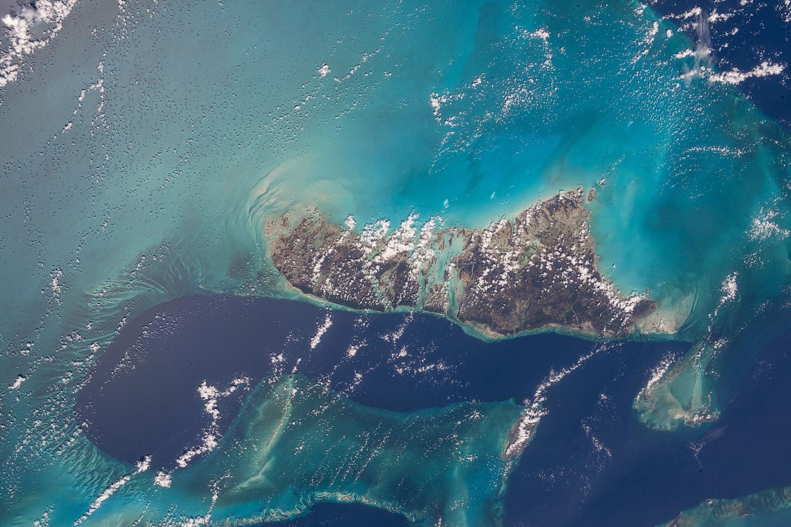 Public Access: aerial view of islands with turquoise water and white sand