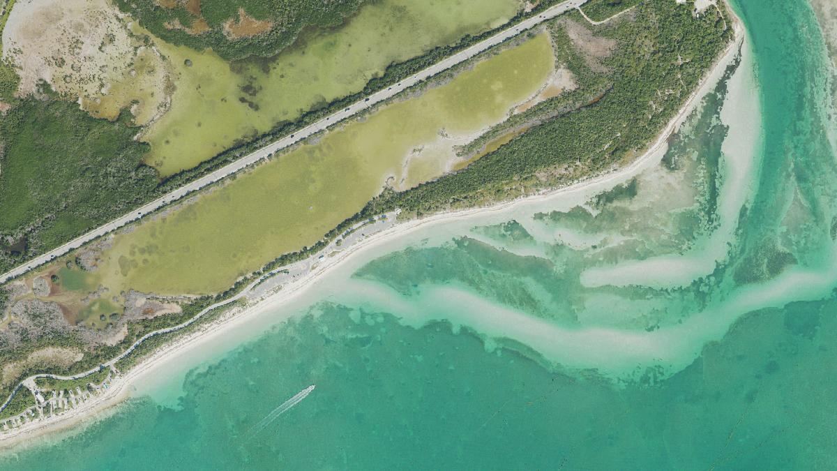 Aerial view of Sandspur Beach in Marathon, Florida, shoreline and surroundings, USDA NAIP imagery from May 2023