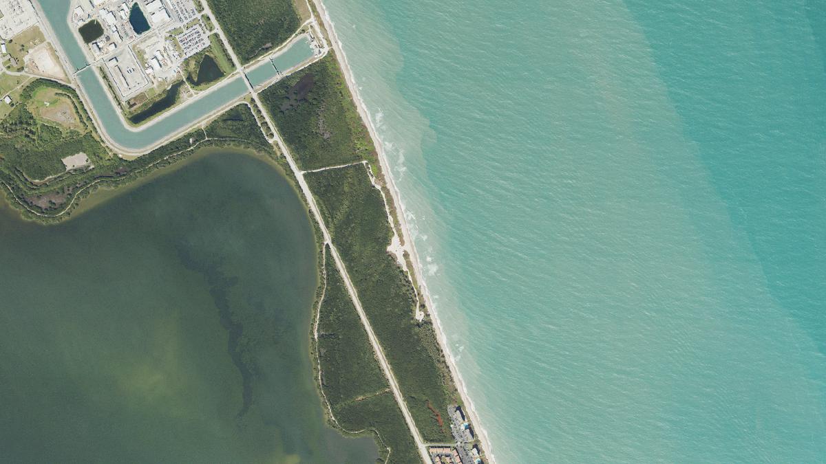 Aerial view of Walton Rocks Beach in Florida, shoreline and surroundings, USDA NAIP imagery from May 2023